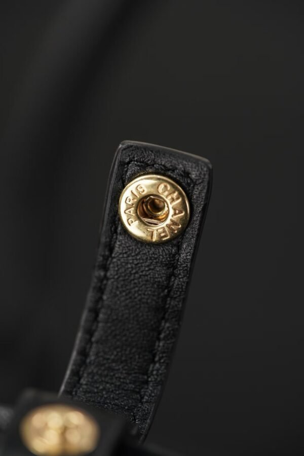 CHANEL Clutch with Leather Strap