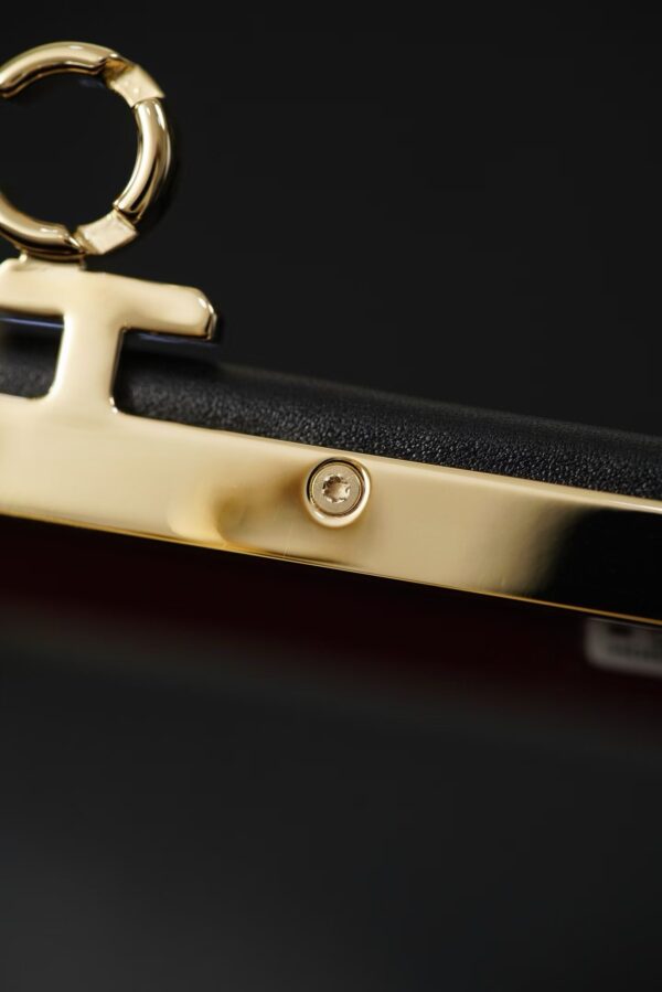 CHANEL Clutch with chain