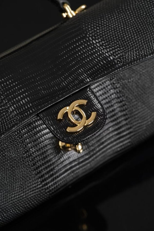 CHANEL Clutch with chain