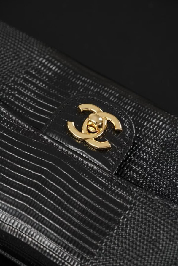 CHANEL Clutch with chain