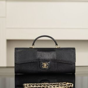 CHANEL Clutch with chain