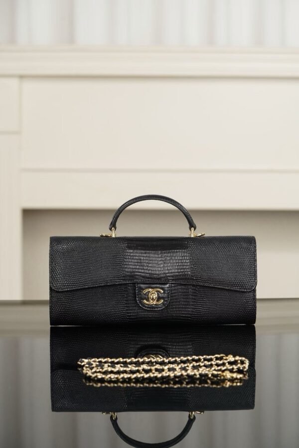 CHANEL Clutch with chain