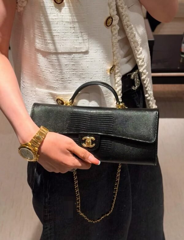 CHANEL Clutch with chain
