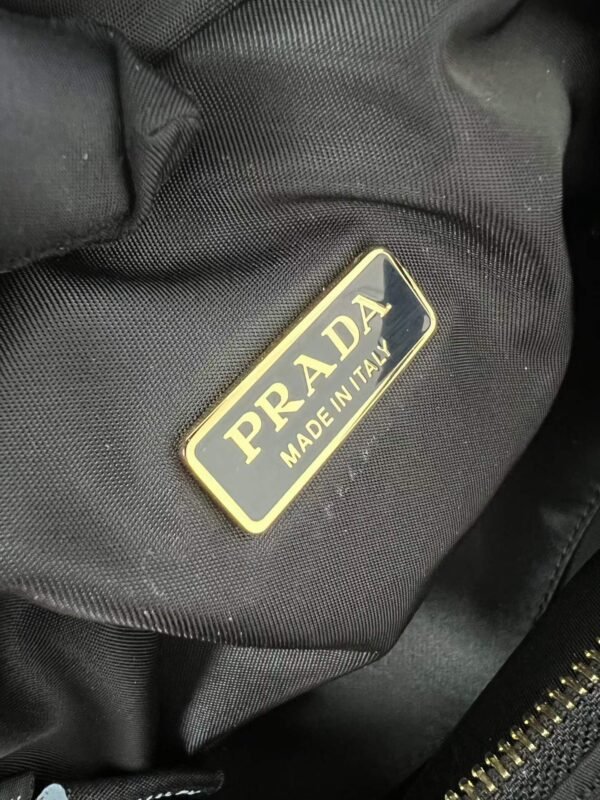 Prada Explore Re-Nylon shoulder bag with flap MINI