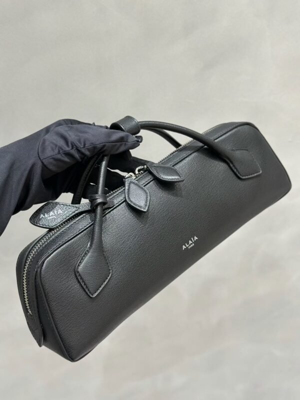 ALAIA LE TECKEL CLUTCH IN HAIRCALF