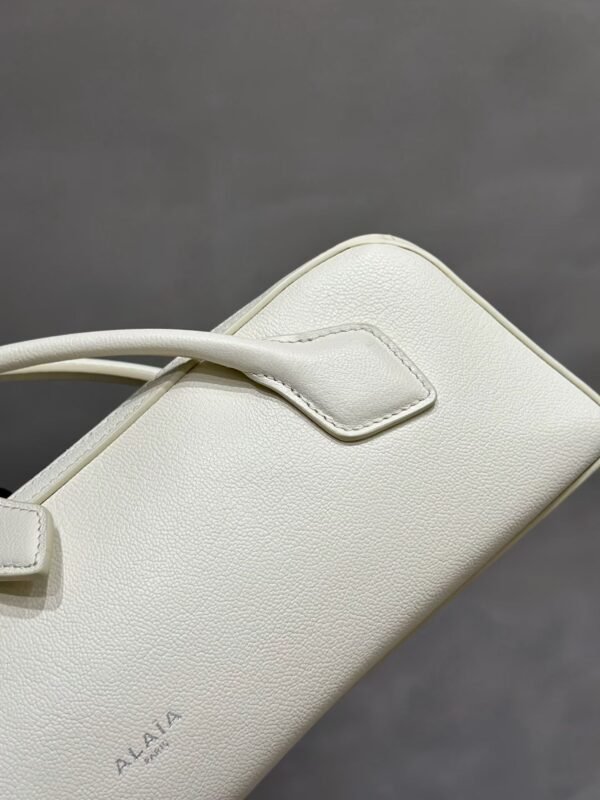 ALAIA LE TECKEL CLUTCH IN HAIRCALF