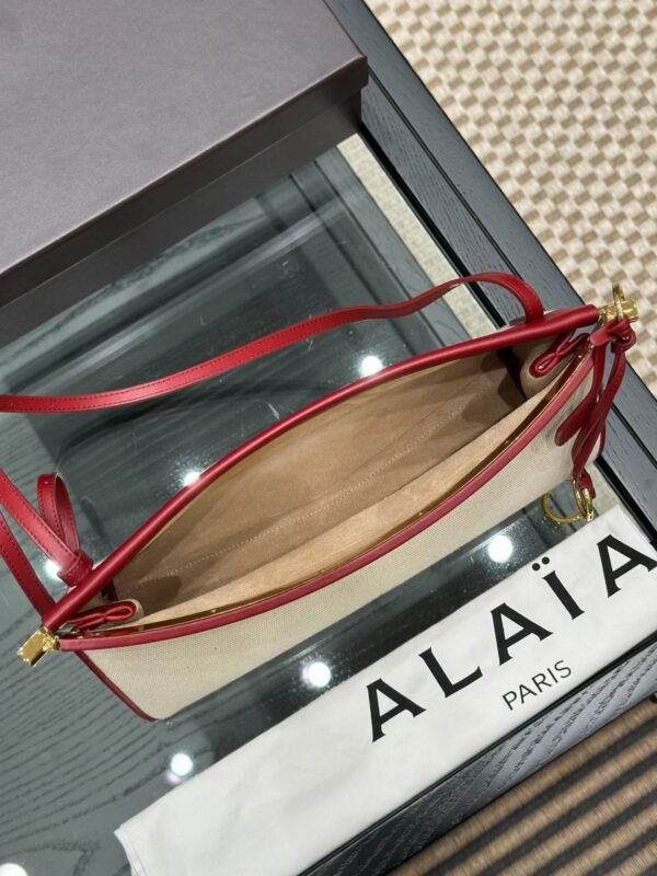 ALAIA LE CLICK EAST WEST MEDIUM BAG IN CANVAS