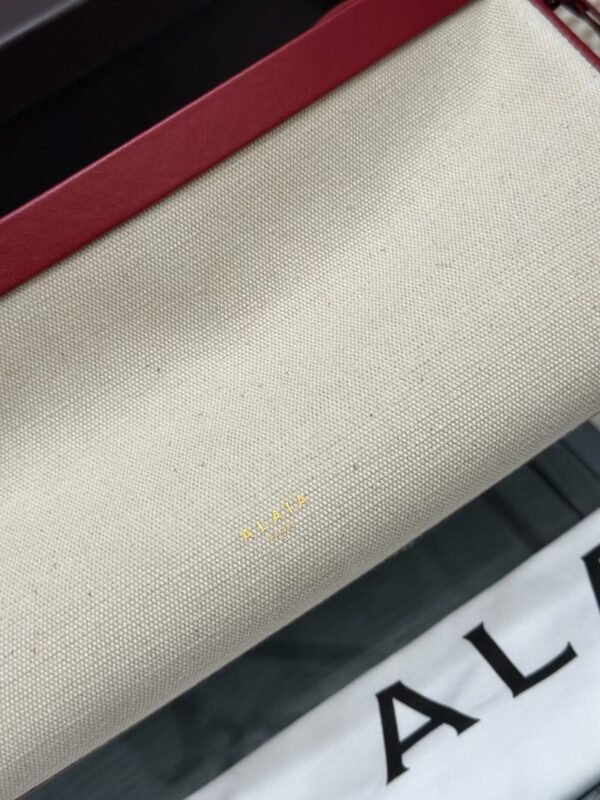 ALAIA LE CLICK EAST WEST MEDIUM BAG IN CANVAS