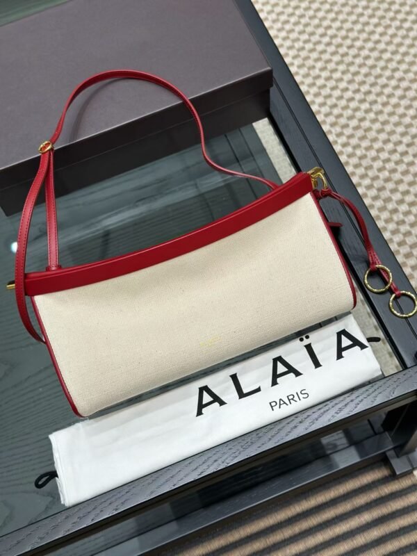 ALAIA LE CLICK EAST WEST MEDIUM BAG IN CANVAS
