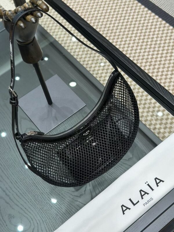 ALAIA ONE PIECE DEMI LUNE BAG IN FISHNET