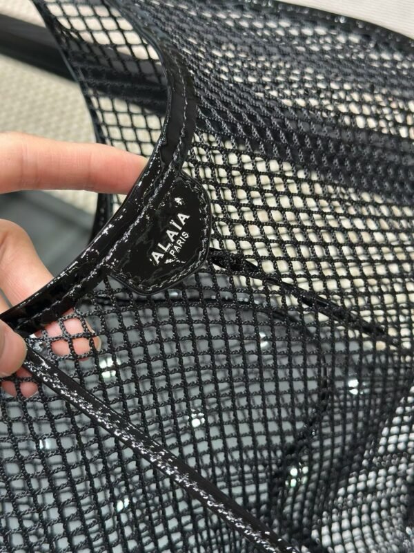 ALAIA ONE PIECE DEMI LUNE BAG IN FISHNET