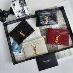 YSL CASSANDRE card case in crocodile-embossed shiny leather